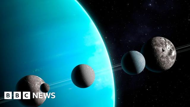 Artwork of Uranus and five of its moons